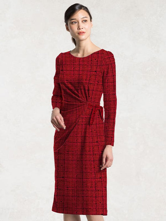 Woman wearing a long-sleeve red midi dress